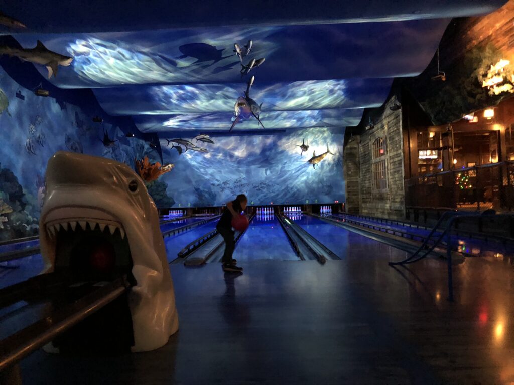 All The Best Places To Play Indoors In Austin- bowling at uncle buck's fish bowl inside bass pro shops in round rock