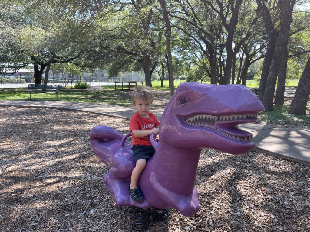 Purple dinosaur in Springwoods Park- You Will Love These Austin Spots With Dinosaurs