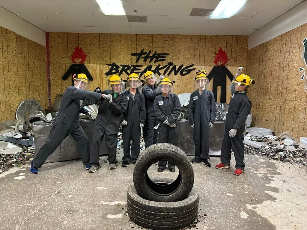 Teens coping at The Breaking Point Rage Room