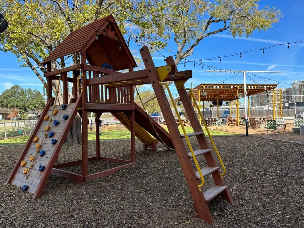 Camp Out Austin restaurant with outdoor playground and seating