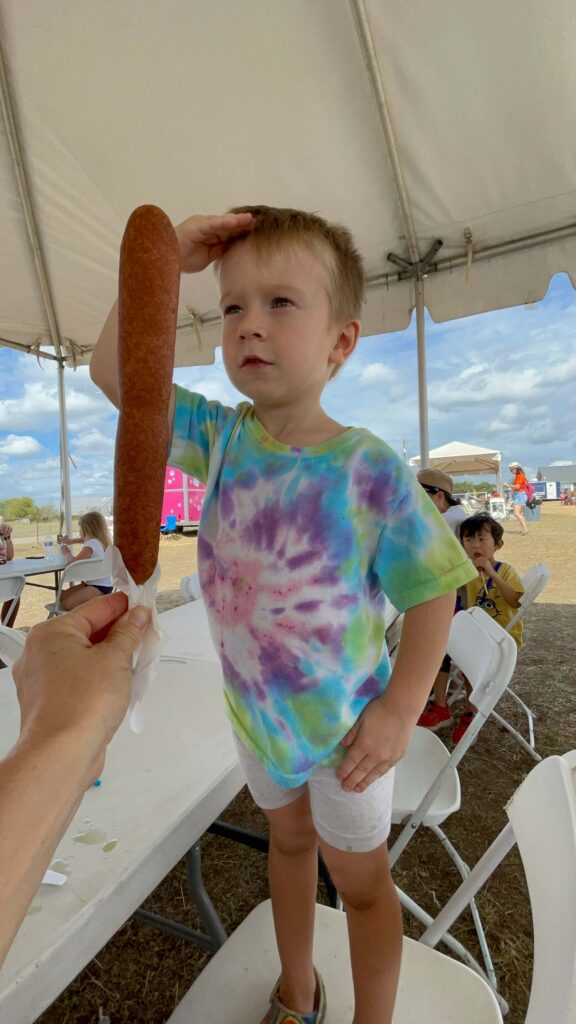 giant corn dog at texas pumpkin fest in leander