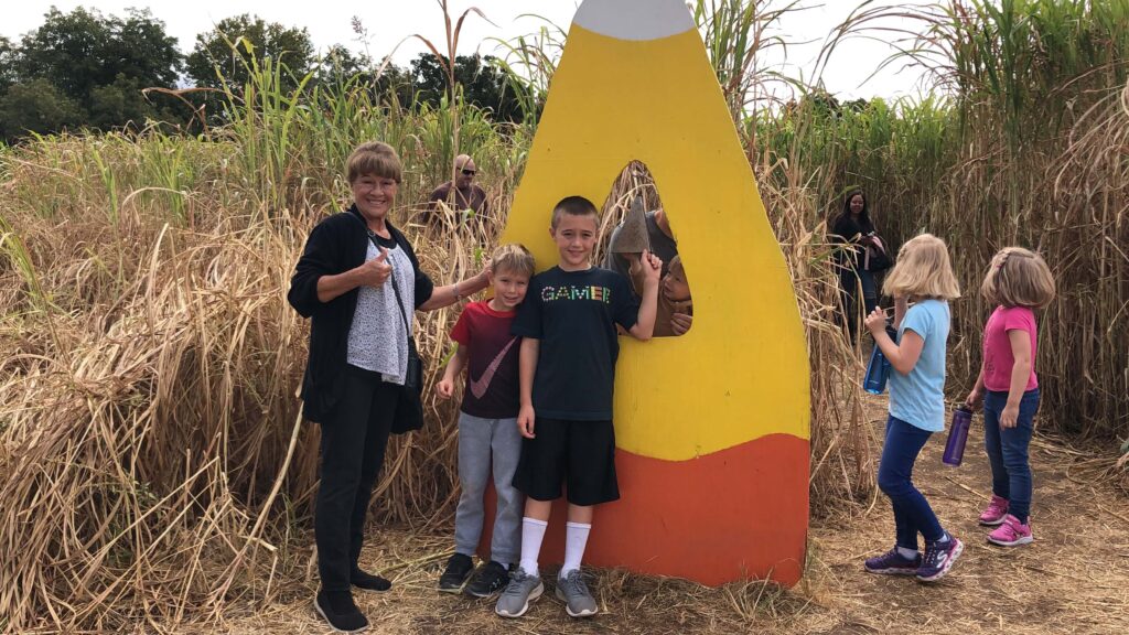 ringing the bell at the corn maze at sweet berry farm