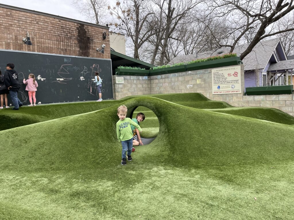 home slice north loop austin restaurant with playground