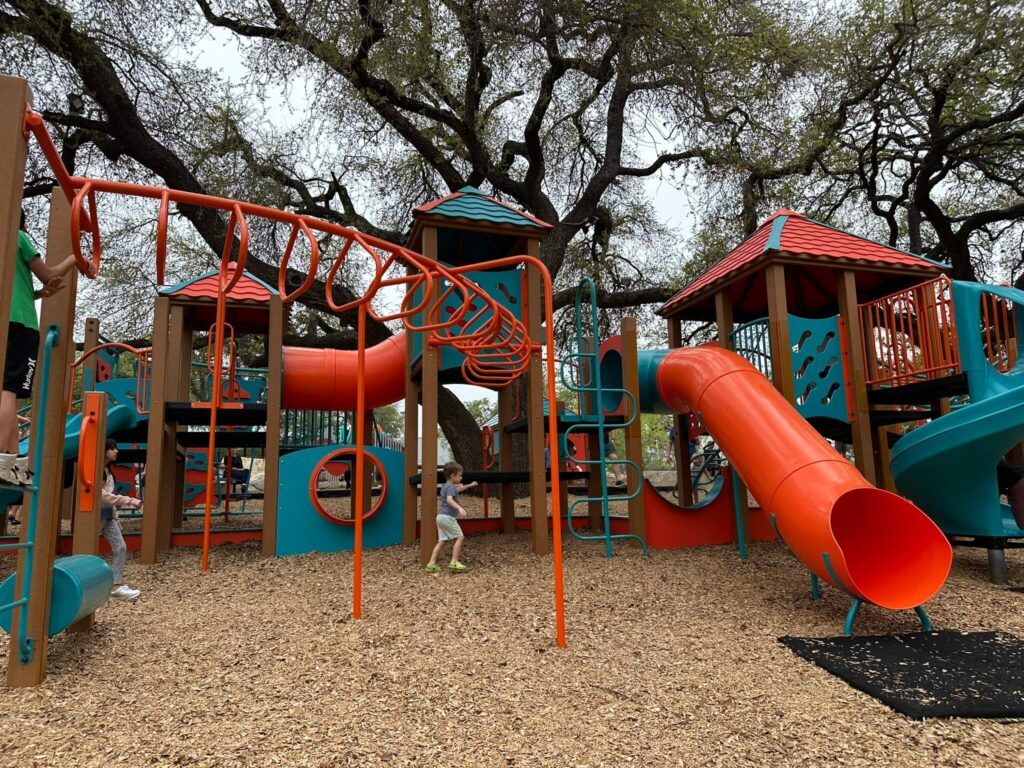 southpark meadows south austin restaurants with shared outdoor playground area