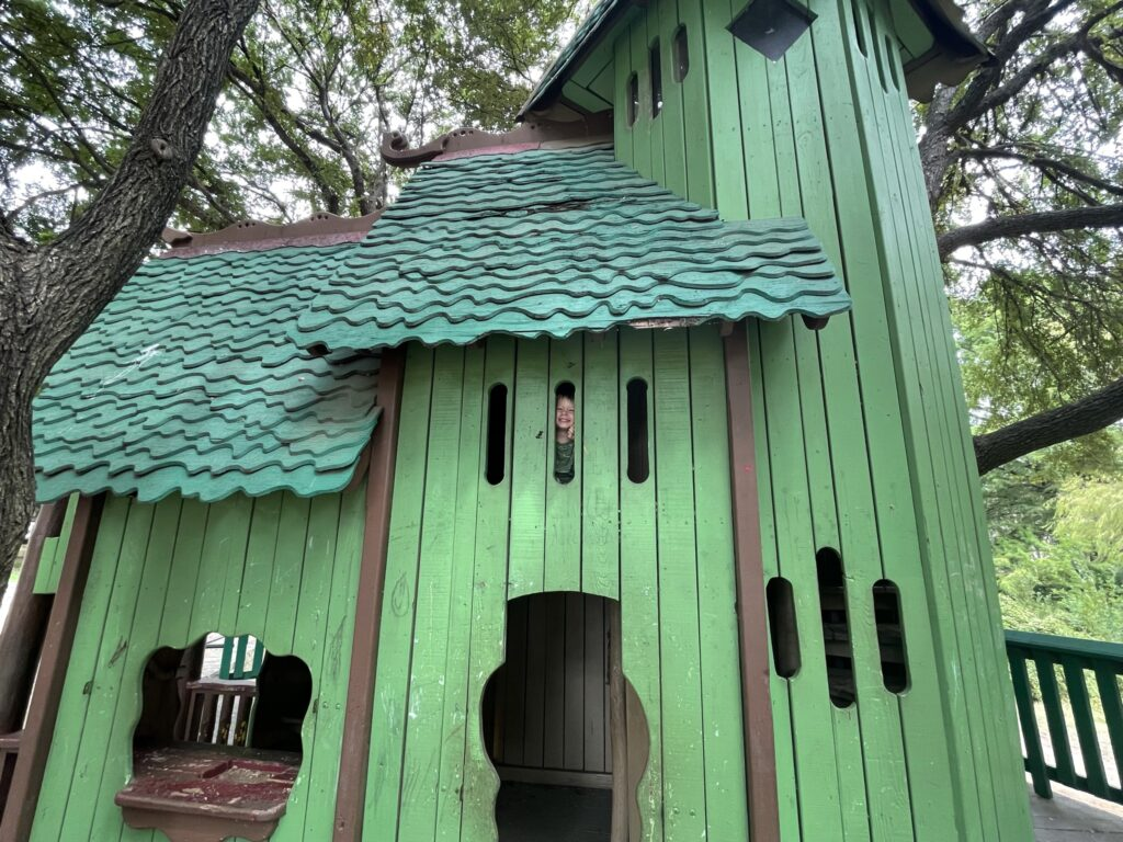 little green playhouse at katherine fleischer park in austin