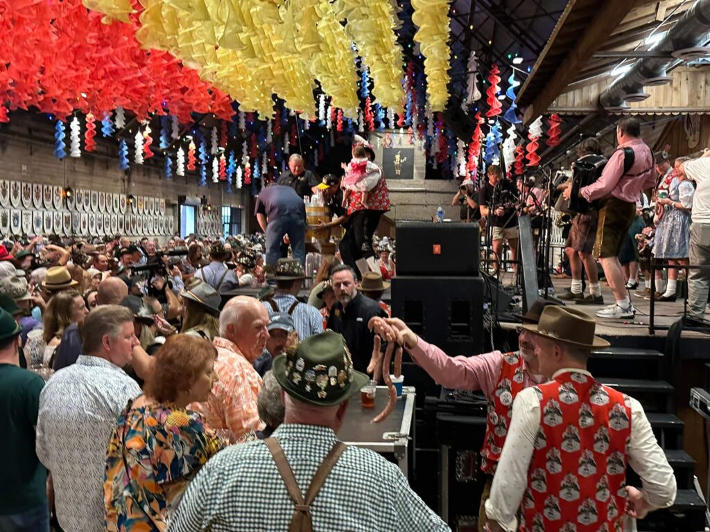 the biting of the sausage at wurstfest in new braunfels