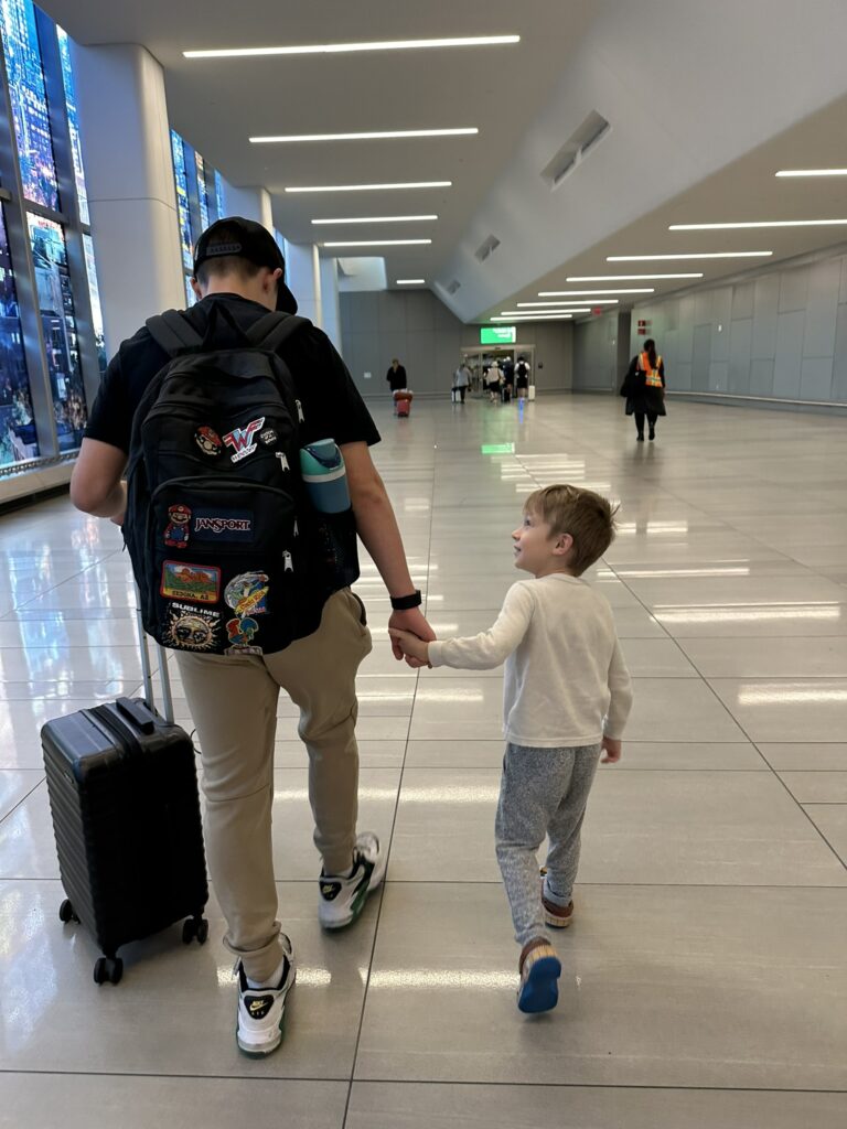 La Guardia airport with our favorite amazon luggage