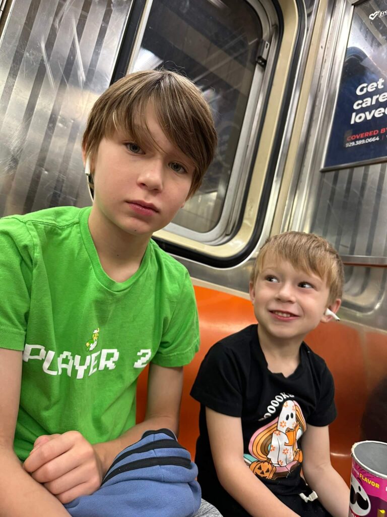 kids on the subway in new york