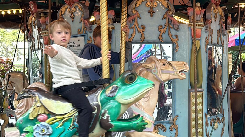 riding the carousel at bryant park new york