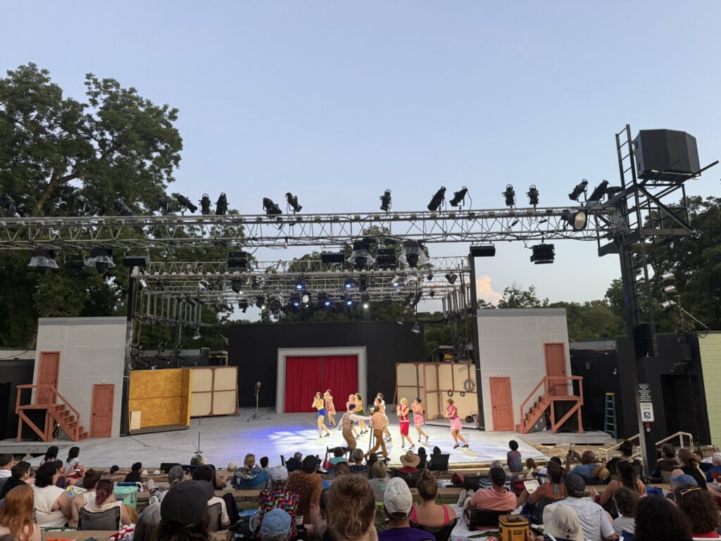 singing in the rain at zilker hillside theater